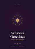 Season's Greetings card, a faceted gold ornament with a star on deep plum