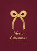 Christmas card with a gold ribbon bow on deep wine red