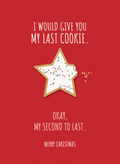Christmas card with an iced star cookie with a bite missing